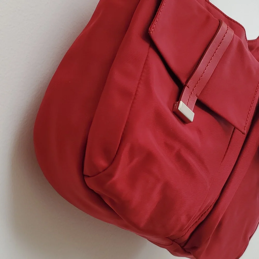 Tumi Pucket E/W Flap Crossbody Messenger Bag in Red with Silver Hardware